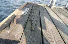 We repair decks, docks and porches.  This is the dock before repair.